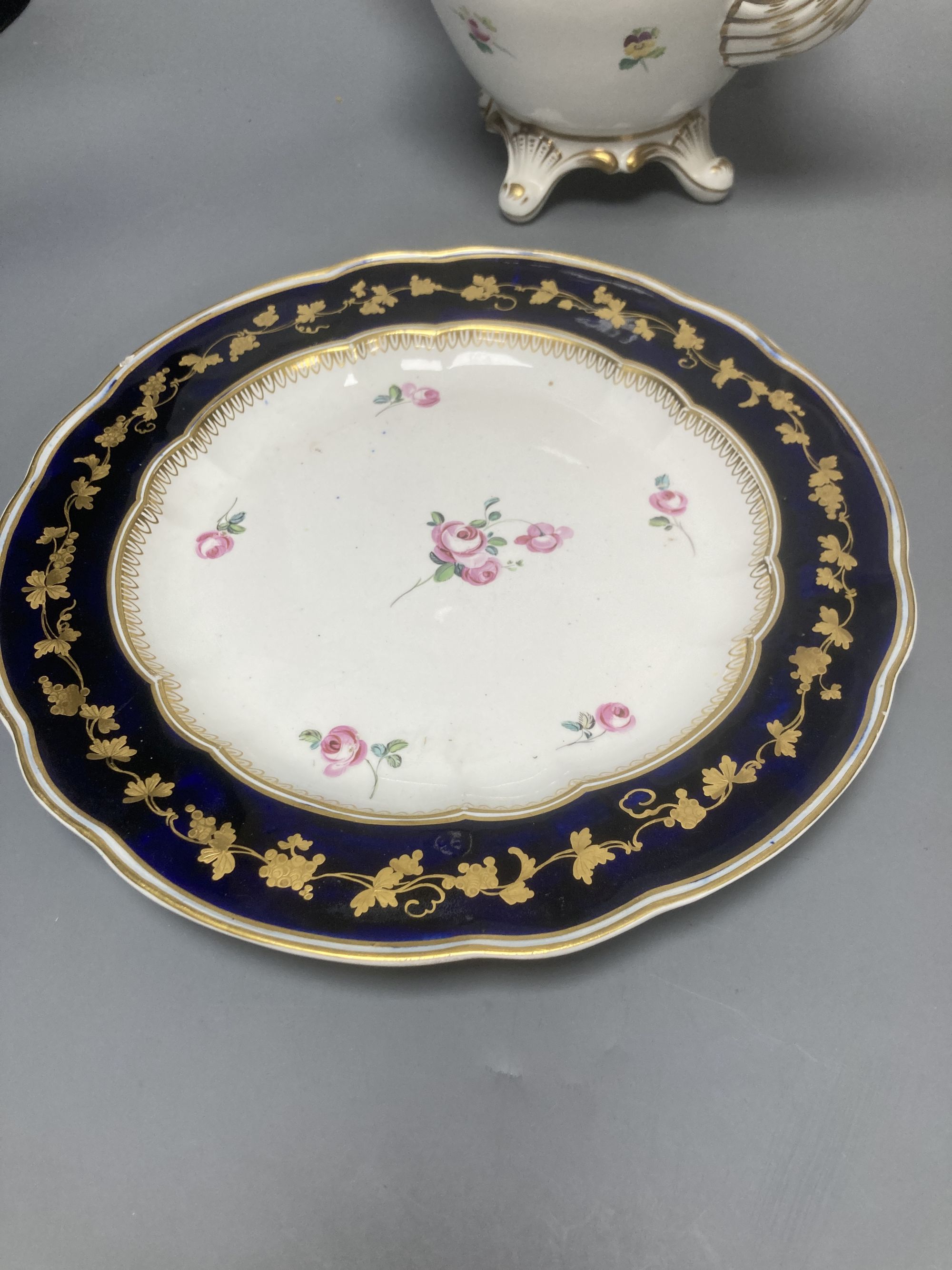 A Sevres outside decorated vase, dated 1877, Spode and Derby plates, a teapot and two other items